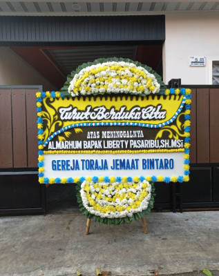 Papan Bunga Duka di Wunung