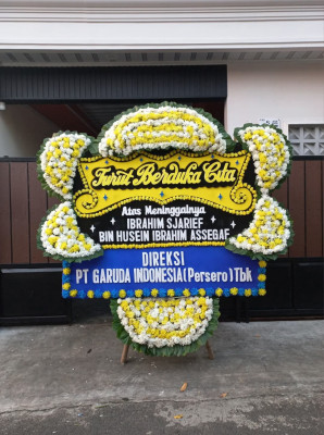 Papan Bunga Duka di Wunung